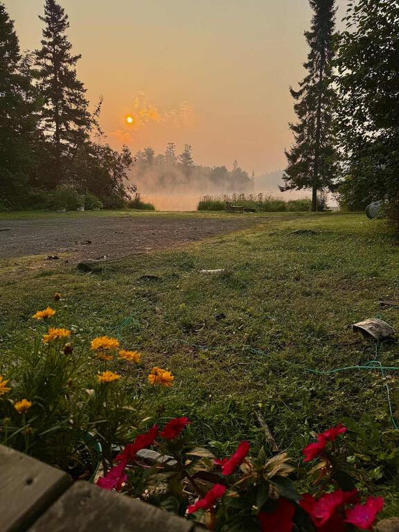 The view of East Bearskin Lake from staff housing on a misty morning.