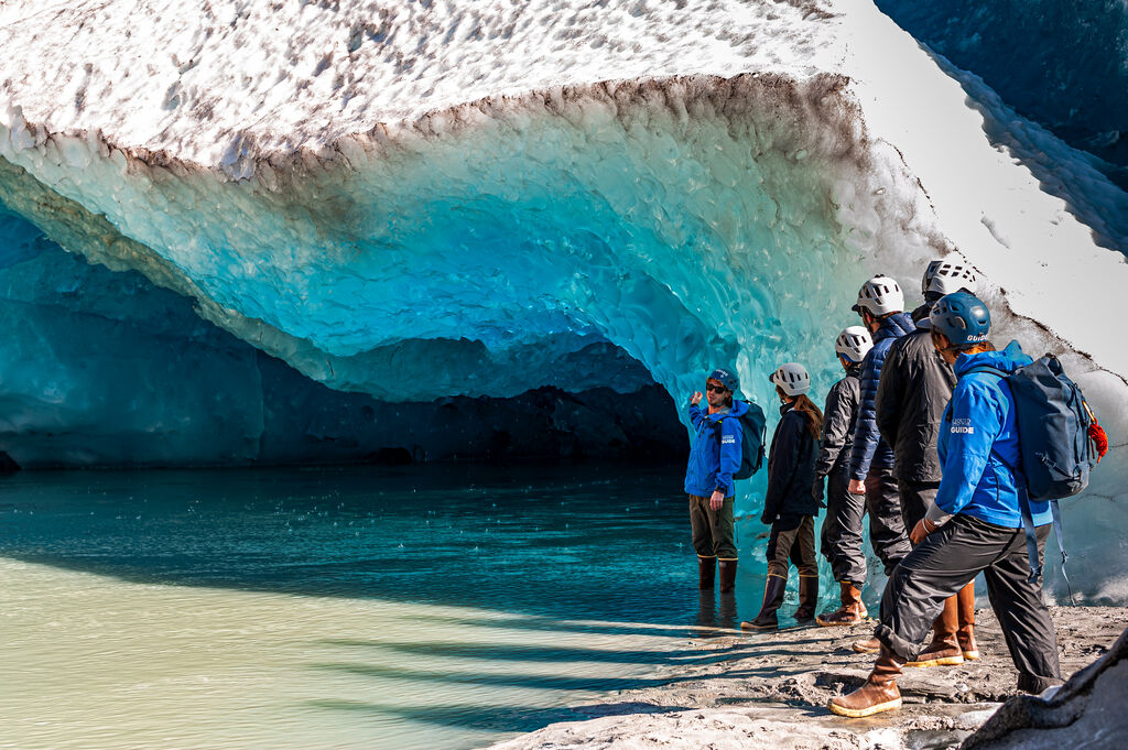 Exploring the glacier's blue ice with guests