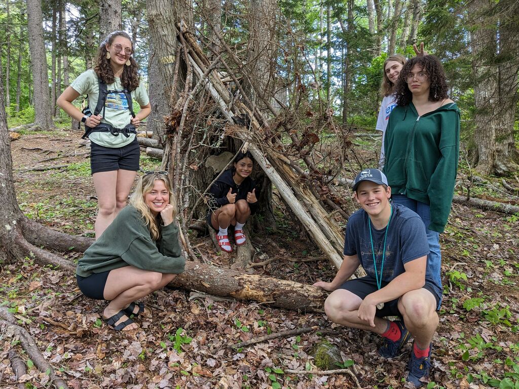 Staff building a shelter