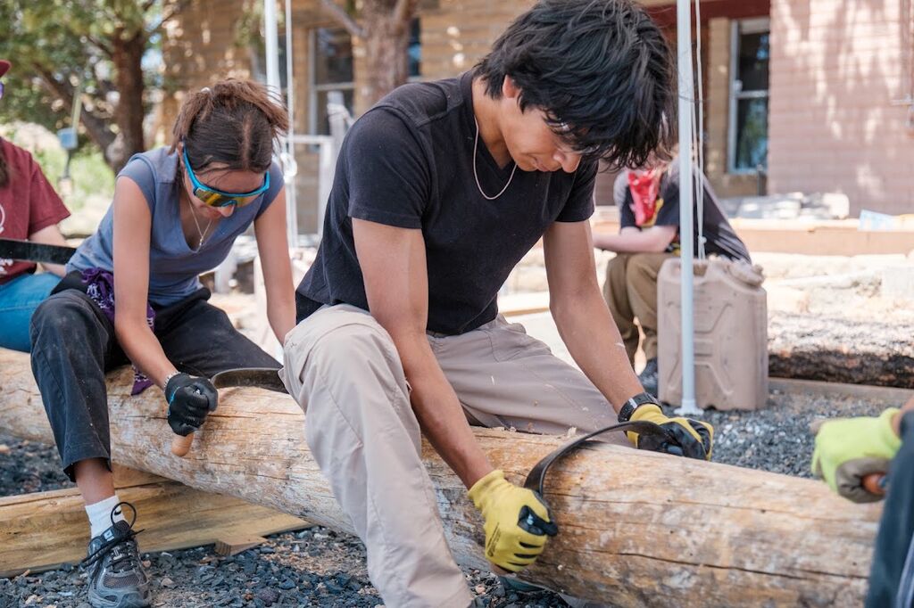 Learning to shape ponderosa beams for a new community center on Hopi