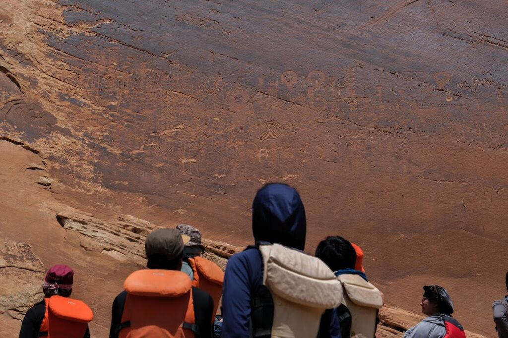 Pausing at a cultural site on the riverbank